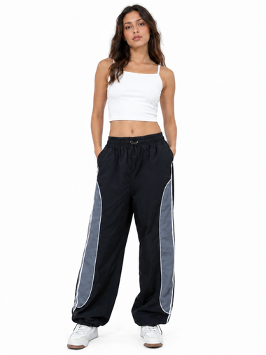 Pantalón Negro Mujer ENKI - Power Track Tela Mojada