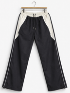 Pantalón Baggy Bicolor Tela Nova — Negro / Crema | ENKI - ENKI ModaStyle