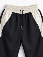 Pantalón Baggy Bicolor Tela Nova — Negro / Crema | ENKI - ENKI ModaStyle