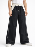 Pantalón Baggy Bicolor Tela Nova — Negro / Crema | ENKI - ENKI ModaStyle