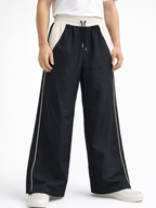 Pantalón Baggy Bicolor Tela Nova — Negro / Crema | ENKI - ENKI ModaStyle