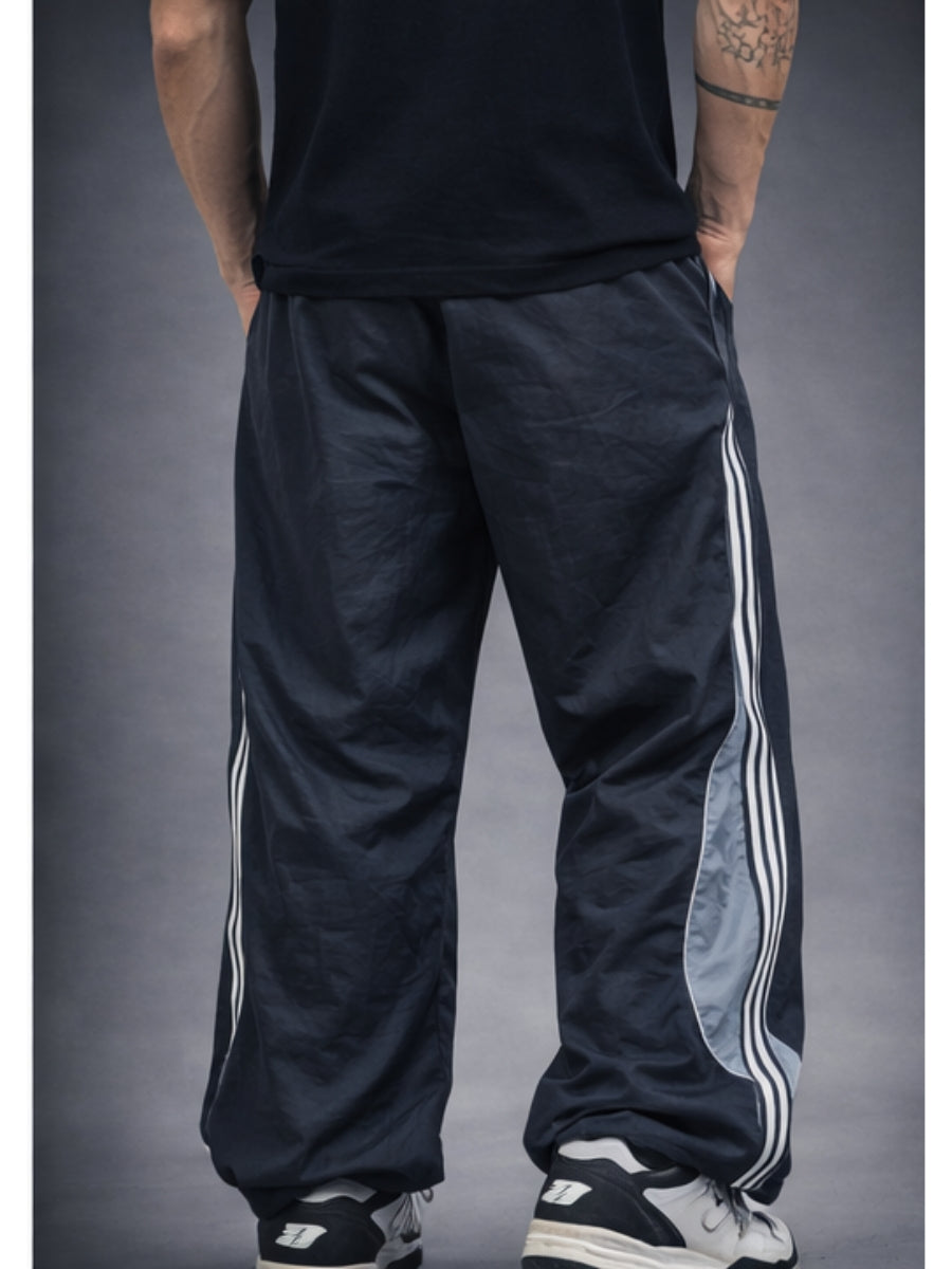 Pantalón Power Track Hombre Tela Mojada Deportivo Urbano ENKI ModaStyle