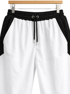 Pantalón Baggy Bicolor Tela Nova — Blanco / Negro | ENKI - ENKI ModaStyle