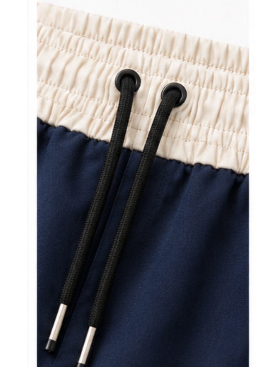 Pantalón Deportivo Oversized Azul Marino Bicolor — Tela Nova | Mujer | ENKI - ENKI ModaStyle