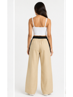 Pantalón Oversized Bicolor Beige/Negro — Tela Nova | Mujer | ENKI - ENKI ModaStyle