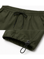 Pantalón Cargo Convertible Verde Militar — Tela Mojada | Mujer | ENKI - ENKI ModaStyle