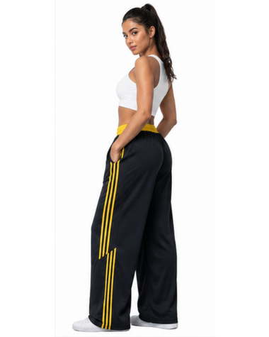 Pantalón Deportivo Oversized Mujer Negro con Franjas Amarillas — Tela Nova | ENKI