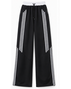 Pantalón Deportivo Oversized Negro con Franjas Blancas — Tela Nova | Mujer | ENKI - ENKI ModaStyle