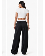 Pantalón Deportivo Oversized Negro con Franjas Blancas — Tela Nova | Mujer | ENKI - ENKI ModaStyle