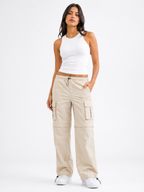 Pantalón Cargo Convertible Hueso — Tela Mojada | Mujer | ENKI - ENKI ModaStyle