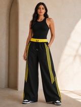 Pantalón Deportivo Parachute Tela Nova Mujer | Franjas Laterales Bicolor | ENKI 1