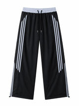 Pantalón Deportivo Parachute Tela Nova Mujer | Franjas Laterales Bicolor | ENKI 10