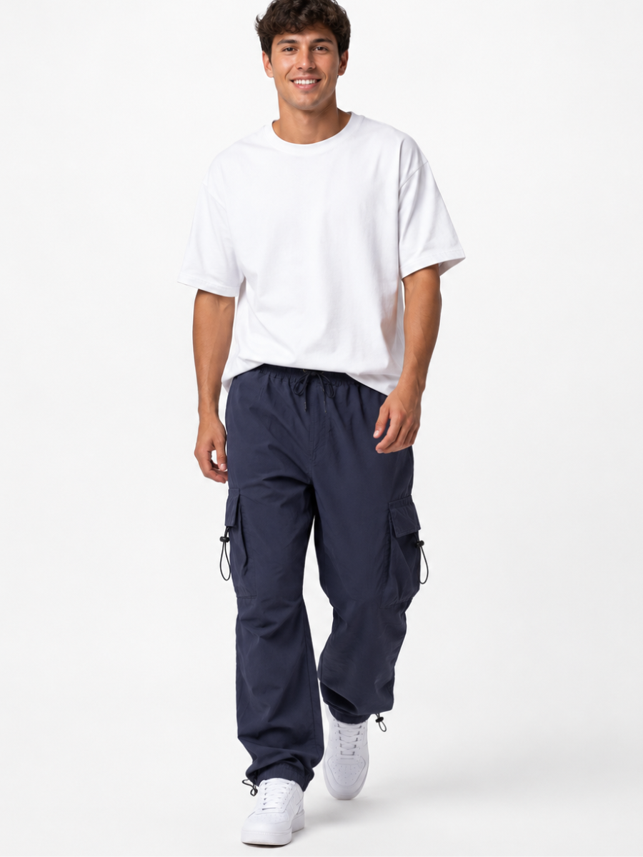 Pantalón Parachute Gris — Tela Mojada | Regulador en Bota | Hombre | ENKI