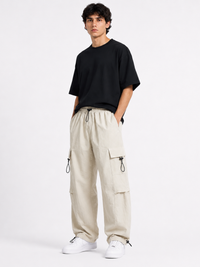 Pantalón Parachute Hueso — Tela Mojada | Regulador en Bota | Hombre | ENKI