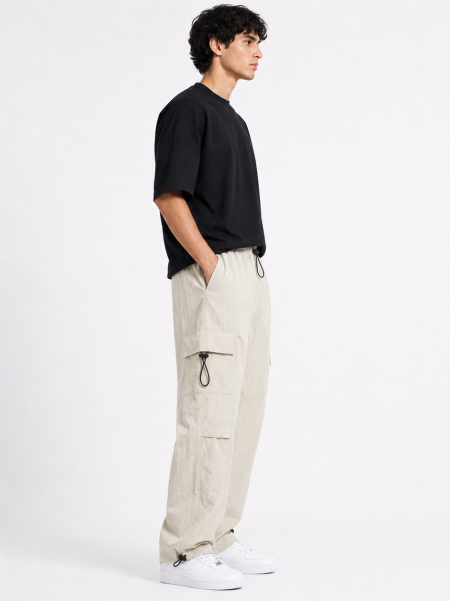 Pantalón Parachute Hueso — Tela Mojada | Regulador en Bota | Hombre | ENKI