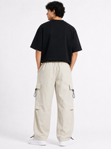 Pantalón Parachute Hueso — Tela Mojada | Regulador en Bota | Hombre | ENKI 3