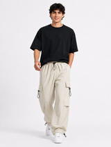 Pantalón Parachute Hueso — Tela Mojada | Regulador en Bota | Hombre | ENKI 4