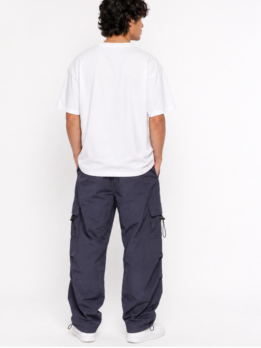 Pantalón Parachute Gris — Tela Mojada | Regulador en Bota | Hombre | ENKI
