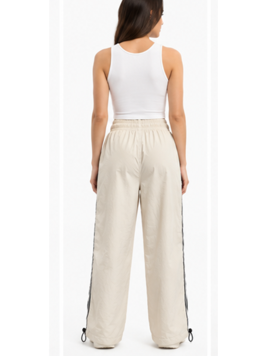 Pantalón Power Track Hueso — Tela Mojada | Mujer | ENKI - ENKI ModaStyle