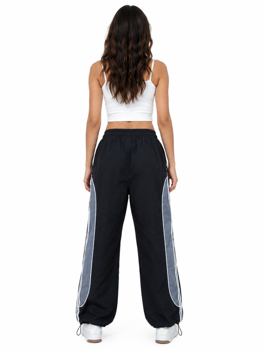 Pantalón Power Track Negro — Tela Mojada | Mujer | ENKI - ENKI ModaStyle