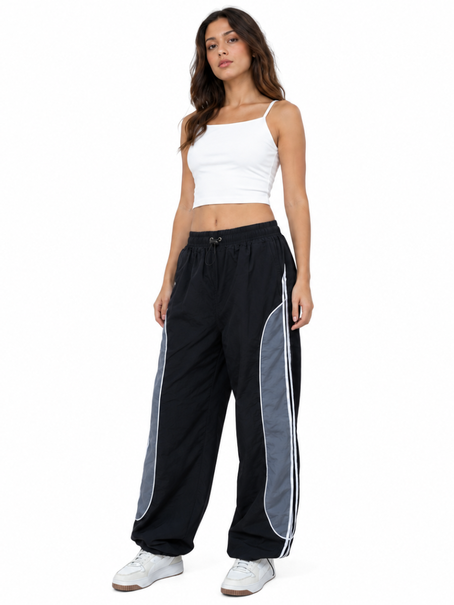 Pantalón Power Track Negro — Tela Mojada | Mujer | ENKI - ENKI ModaStyle