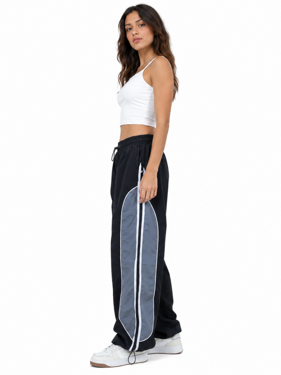 Pantalón Power Track Negro — Tela Mojada | Mujer | ENKI - ENKI ModaStyle