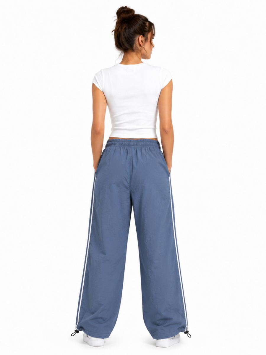 Pantalón Power Track Plomo — Tela Mojada | Mujer | ENKI - ENKI ModaStyle