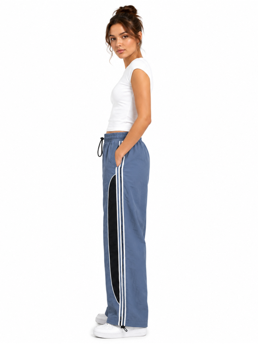 Pantalón Power Track Plomo — Tela Mojada | Mujer | ENKI - ENKI ModaStyle