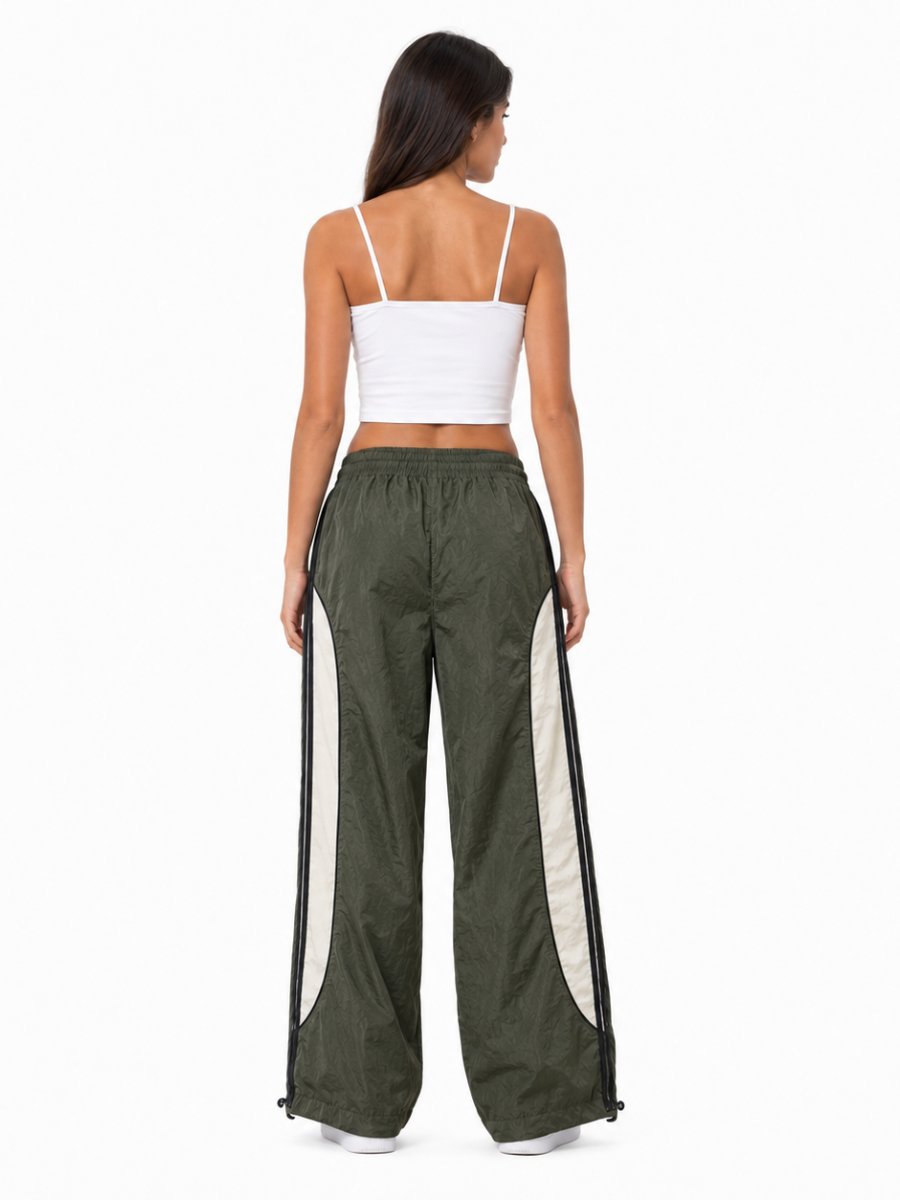 Pantalón Power Track Verde Militar — Tela Mojada | Mujer | ENKI - ENKI ModaStyle