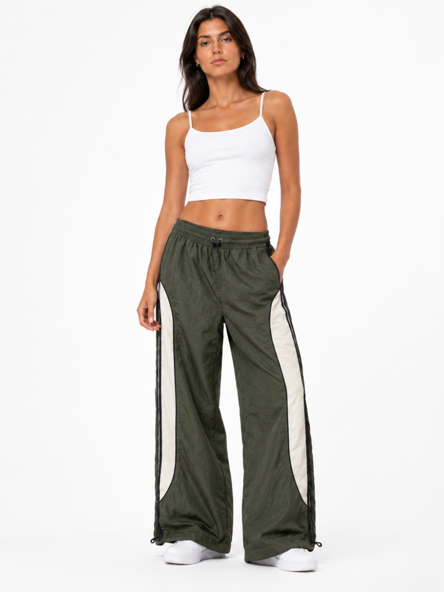 Pantalón Power Track Verde Militar — Tela Mojada | Mujer | ENKI - ENKI ModaStyle